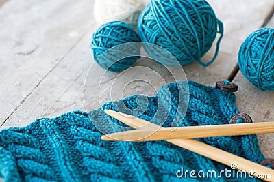 Knitting pattern and needles on a background