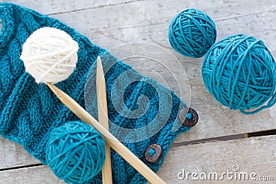 Knitting pattern and needles on a background