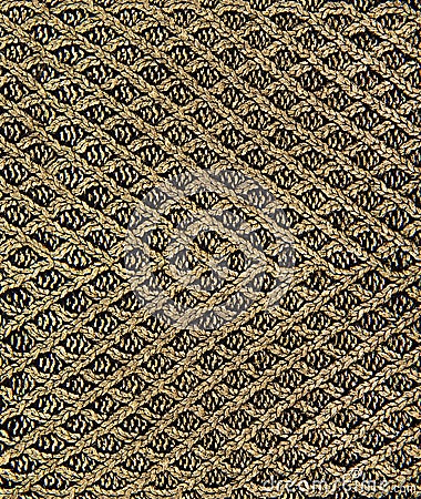 Knitting woolen background in gold and black