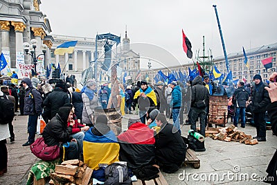 KYIV, UKRAINE: Many students sitting by the barrel with fire on the anti-government protest