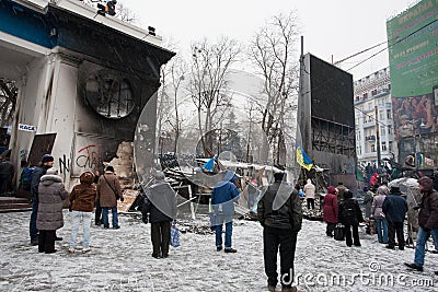 KYIV, UKRAINE: People stand near the barricades hi