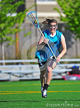 Lacrosse Running to the camera with the ball