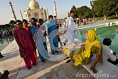 Lady being photographed near Taj Mahal