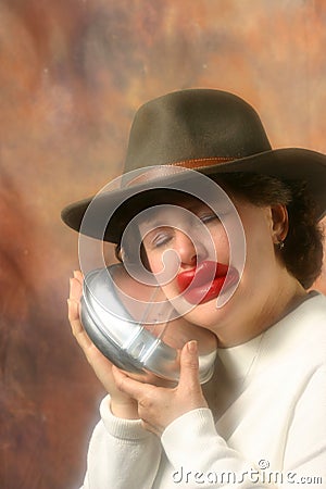 Lady with big lips in cowboy hat