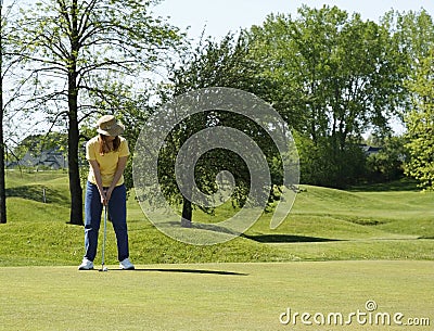 Lady On Golf Putting Green