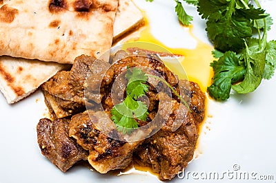 Lamb curry cirrander and Naan close up