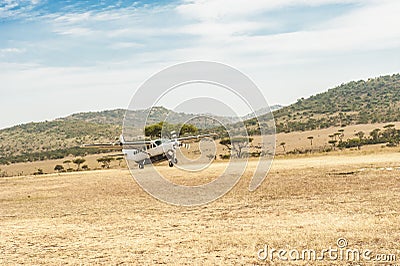 Landing of a small Plane in the Serengeti