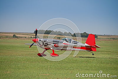 Landing of the small sports plane on the Vrsac airport upon completion of acrobatic flight
