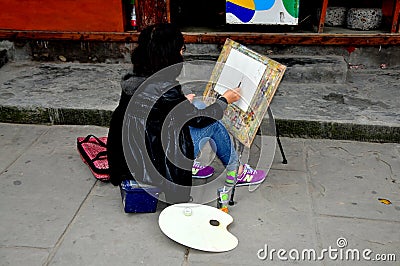 Langzhong, China: Artist Painting on Zhuangyuan Street