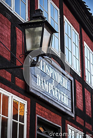 Lantern in front of a store in the old city in Aarhus