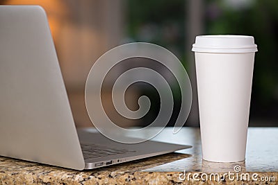 Lap top and coffee cup