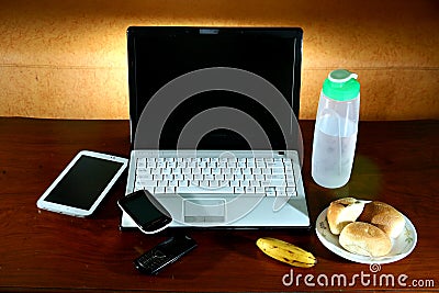 Laptop computer, tablet, smartphone, cellphone, and food