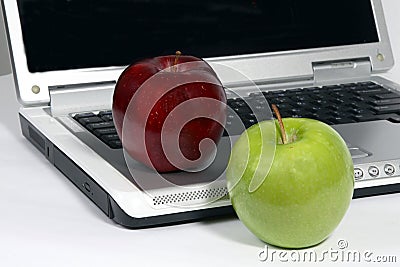 Laptop with red and green apple