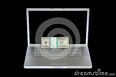 Laptop and US money