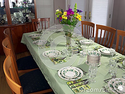 Large table set for fancy dinner