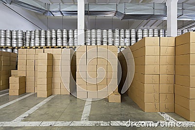 Large warehouse with beer kegs and cardboard boxes in stock brewery Ochakovo