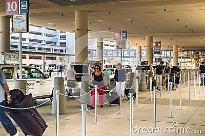 Las Vegas McCarran airport passengers making their way through the taxi line