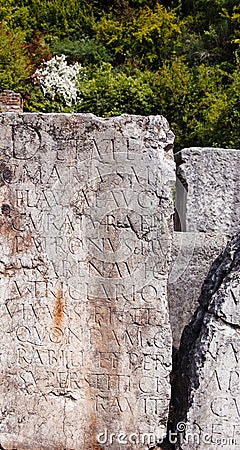 Latin inscription on tomb plate