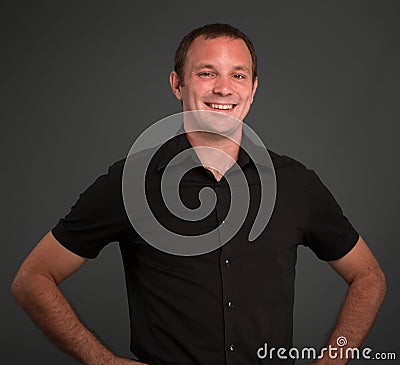 Laughing man in black