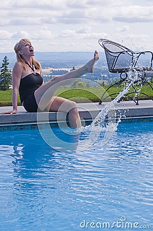 Laughing woman at swim pool