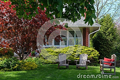 Lawn Chairs in front of a House