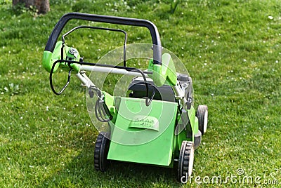 Lawn mower on fresh cut grass