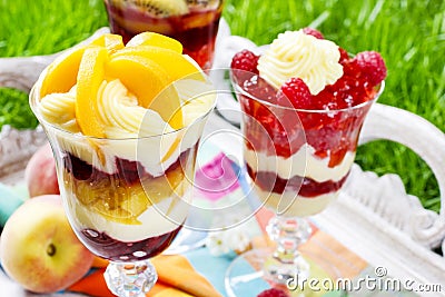 Layer fruit desserts on wooden tra