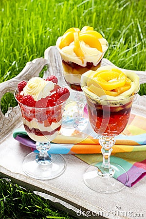 Layer fruit desserts on wooden tray