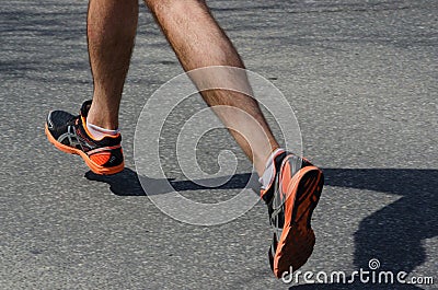 Legs of a man running