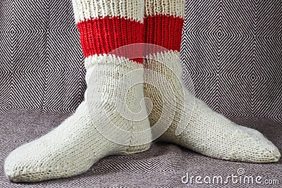 Legs in a red and white socks