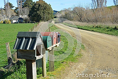 Letterboxes on a dirt farm road, North Canterbury New Zealand.