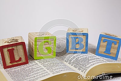 LGBT toy blocks on a bible