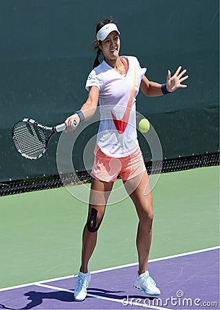 Li Na Chinese Tennis Pro Hitting a Forehand