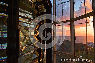 Light beacon mechanism close-up at sunset.