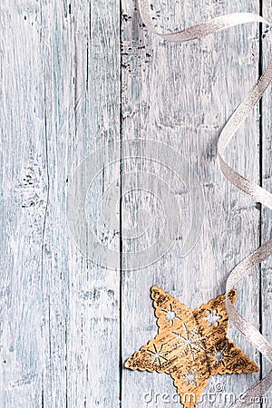 Light blue painted wooden texture with Christmas star