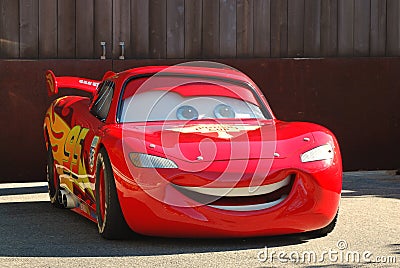 Lightening McQueen from the Pixar movie Cars in a parade at Disneyland, California