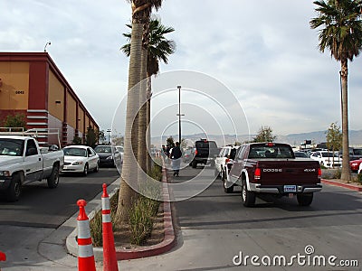 Line of Cars to enter the Fry s parking lot on Black Friday