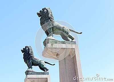 Lions on the columns of the stone bridge. Zaragoza.