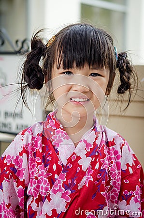 Little asian child in japanese traditional costume