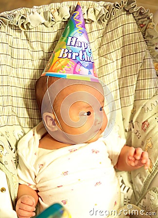 A little baby on birthday party