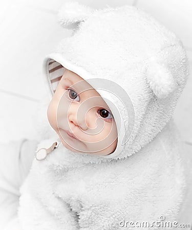 Little baby in white bear costume