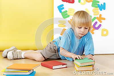 The little boy with books