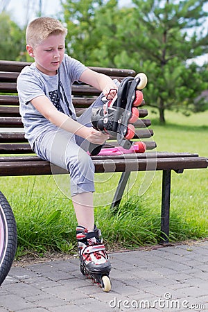 Little boy on roller skates