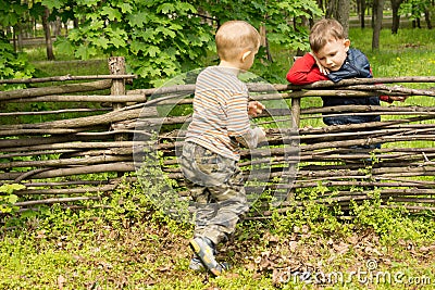 Little boy running over to greet his friend