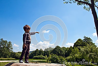 The little boy said, pointing at the sky.