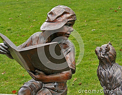 Little Boy Statue Reading to Cat