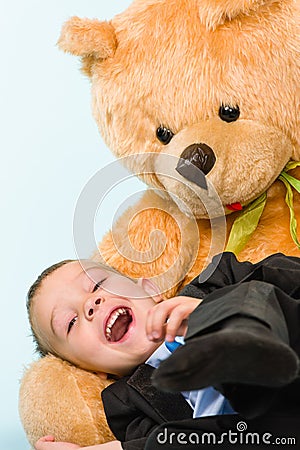 Little boy and teddy bear