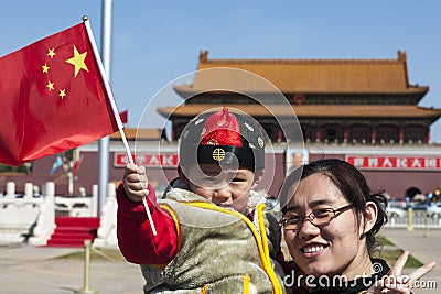 Little Boy waves chinese Flag in Forbidden City, B