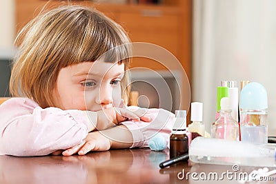 Little cute girl with makeup