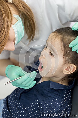 Little girl at the dentist